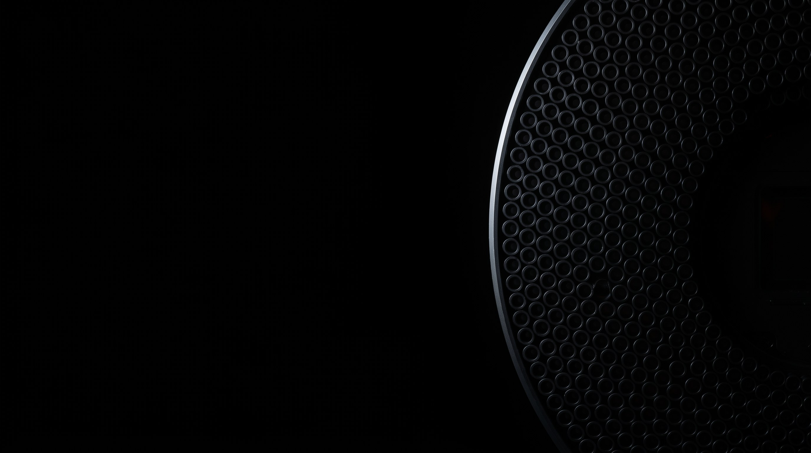Sculptural perforated black surface from the original Typhon AI keynote