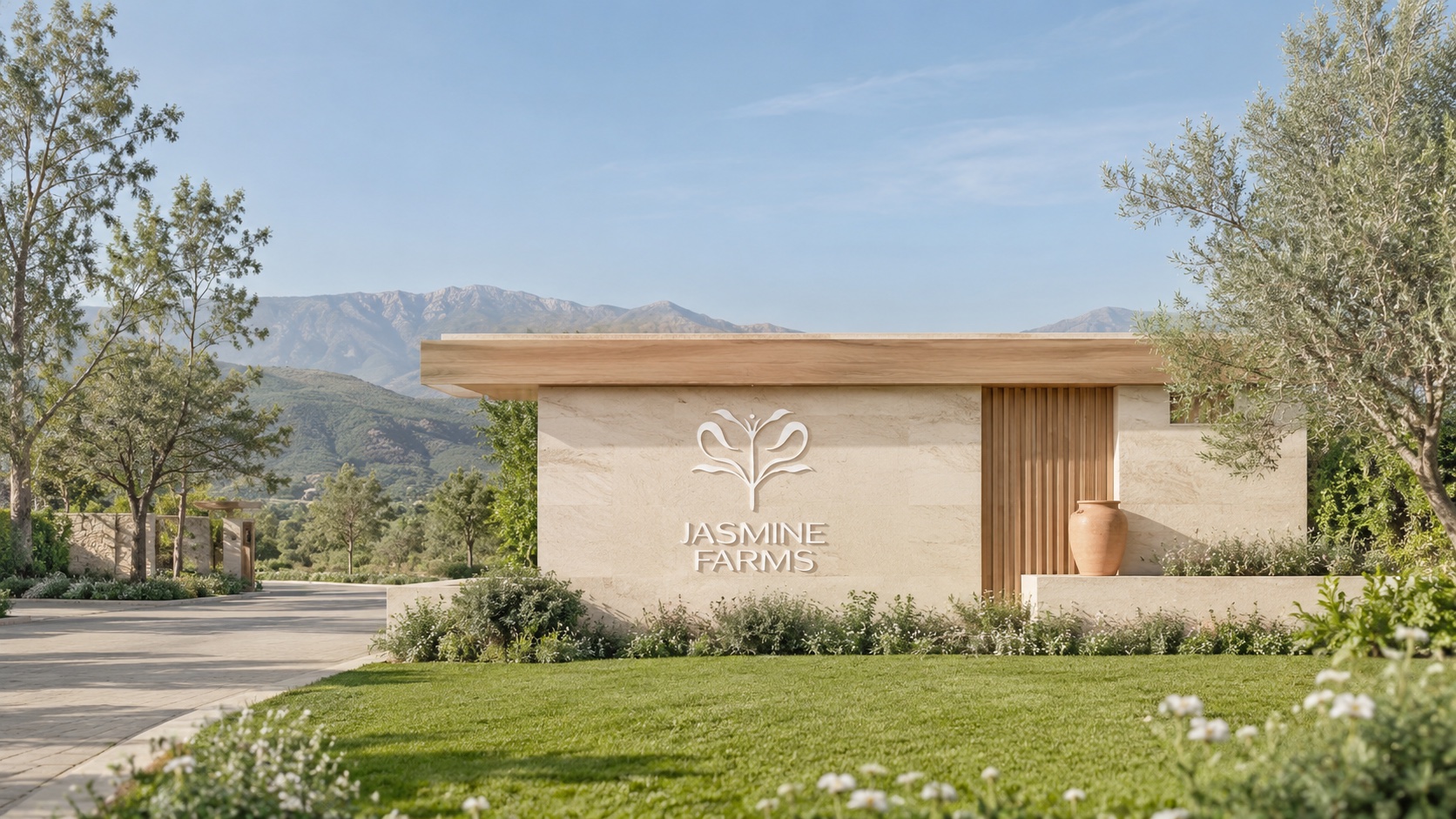 The arrival · A botanical signature set into the estate entrance.