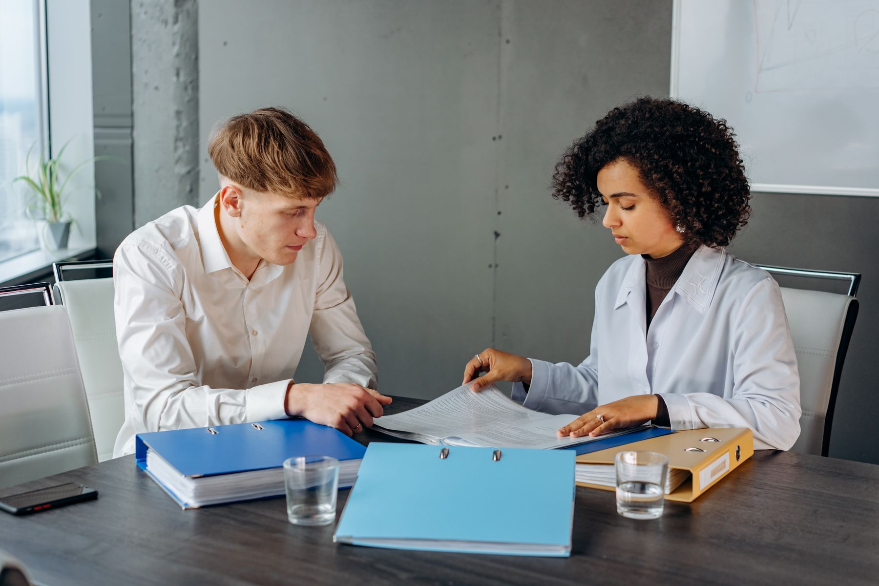 Colleagues reviewing a business plan